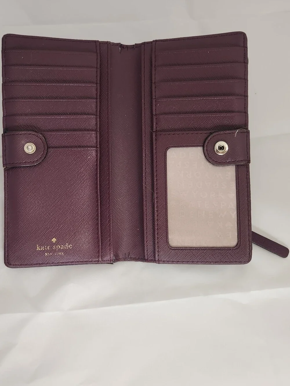 kate spade Plum Saffiano Zip-Around Wallet with Gold Logo Plaque Good Condition!